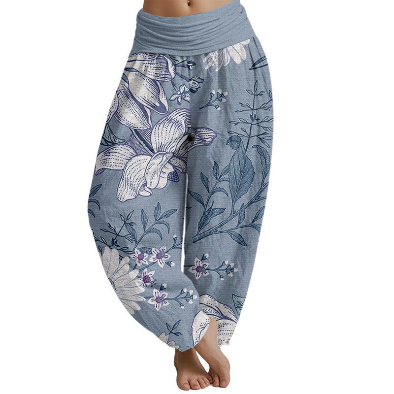 Pantalones harén con cintura elástica para mujer con estampado de flores blancas de margaritas de Mythstone 