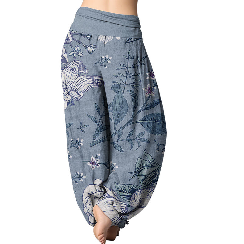 Pantalones harén con cintura elástica para mujer con estampado de flores blancas de margaritas de Mythstone 