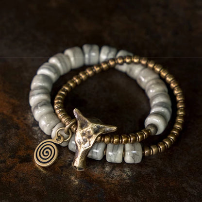 Pulsera de equilibrio de doble vuelta con cabeza de yak de cobre y hueso de yak blanco de Mythstone 