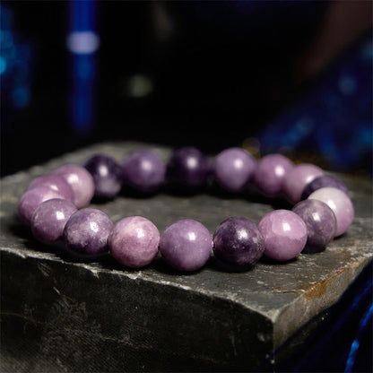 Pulsera positiva con piedra de mica morada Mythstone 