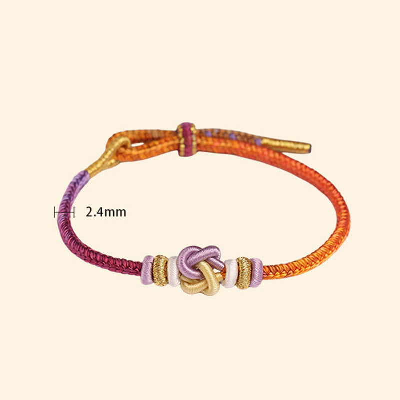 Pulsera trenzada protectora con nudo en forma de corazón y cordón colorido Mythstone 