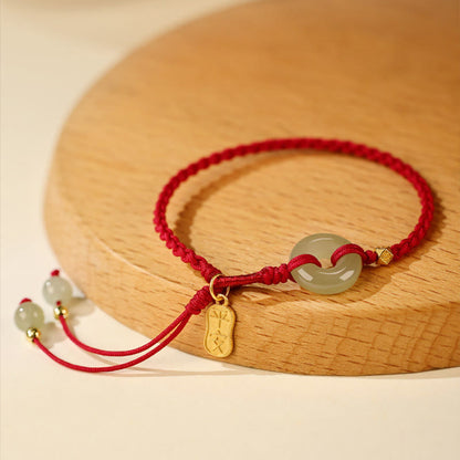 Pulsera trenzada de la suerte con hilo rojo y hebilla de paz de jade hetiano natural Mythstone