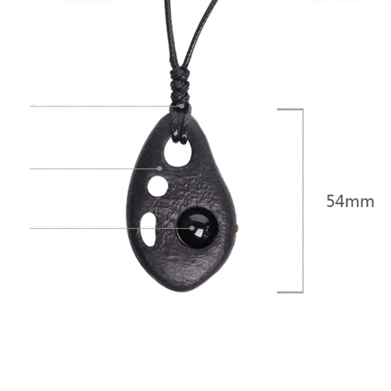 Mythstone Ebony Wood Hollow Inlaid Obsidian Peace Calm Necklace Pendant