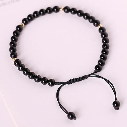 Pulsera de cuerda con cuentas pequeñas de obsidiana negra Mythstone