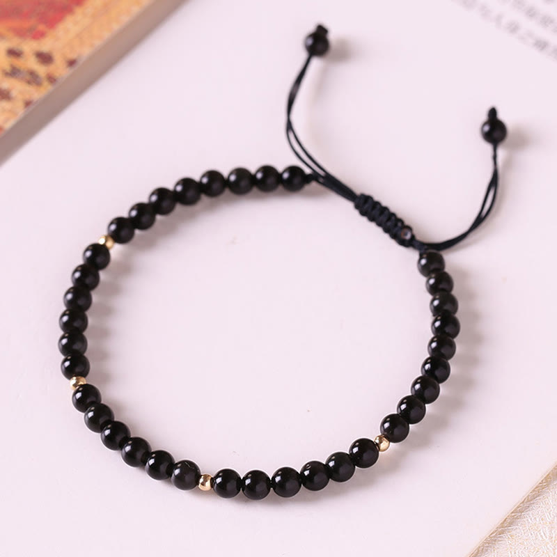 Pulsera de cuerda con cuentas pequeñas de obsidiana negra Mythstone