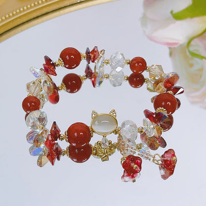 Pulsera de equilibrio de gato de cristal rojo y amatista verde Mythstone 