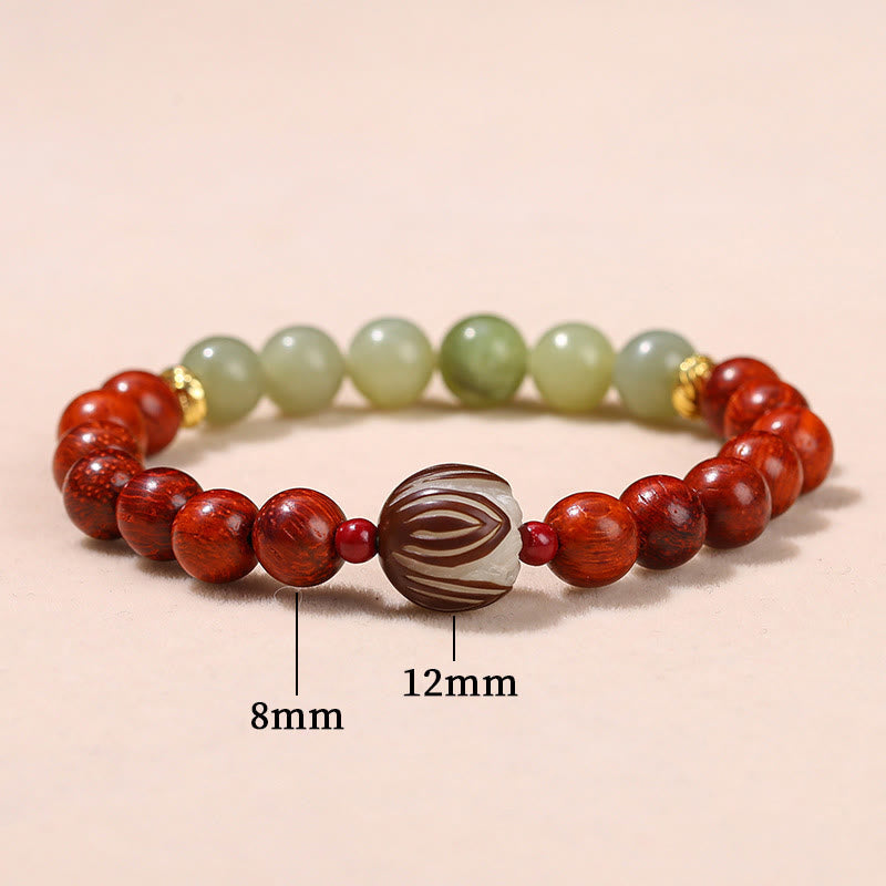 Pulsera de piedra de loto con semillas de bodhi, jade cian y palo de rosa natural que aporta calidez y calma