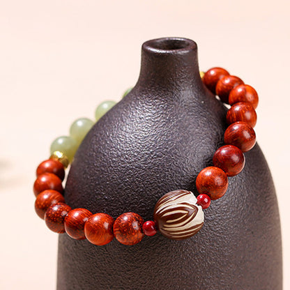 Pulsera de piedra de loto con semillas de bodhi, jade cian y palo de rosa natural que aporta calidez y calma