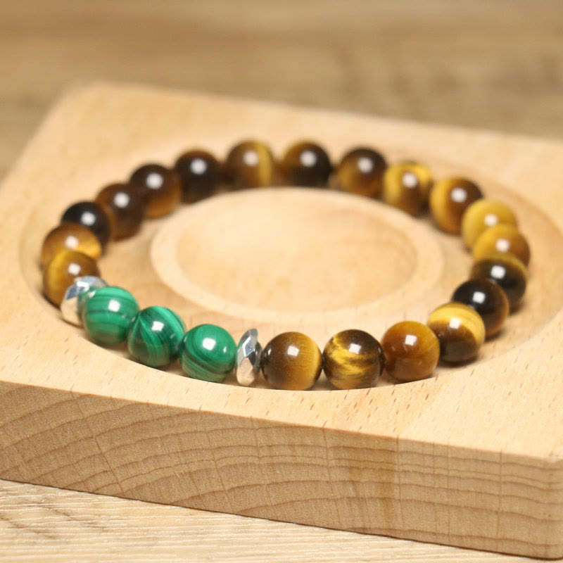 Pulsera de valor con ojo de tigre verde y piedra mitológica 