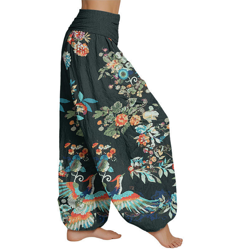 Pantalones harén con cintura elástica para mujer con estampado de flores coloridas, pájaros y hojas de Mythstone 