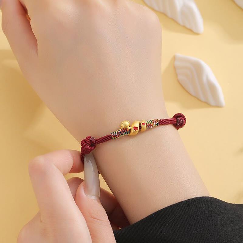 Pulsera trenzada de protección del año de la serpiente con hilo rojo de aleación de cobre Mythstone 