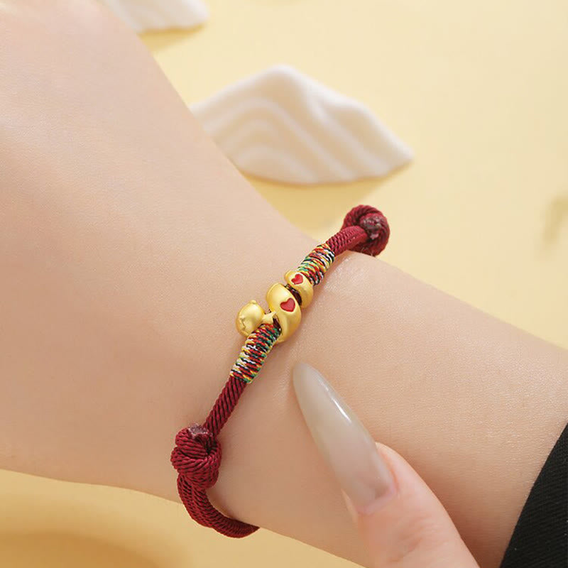 Pulsera trenzada de protección del año de la serpiente con hilo rojo de aleación de cobre Mythstone 