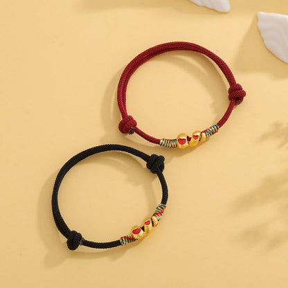 Pulsera trenzada de protección del año de la serpiente con hilo rojo de aleación de cobre Mythstone 