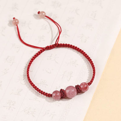 Pulsera tobillera tejida con hilo rojo y cristal de cuarzo fresa natural Mythstone