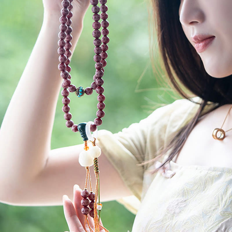 Pulsera de armonía grabada con semilla de bodhi roja de Mythstone Om Mani Padme Hum Lotus 