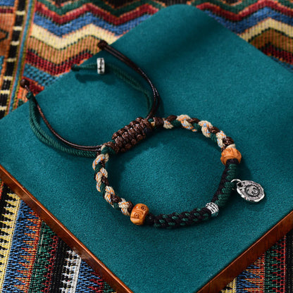 Pulsera de cuerda de la riqueza con cuentas tibetanas Dzi y hueso de yak de ágata