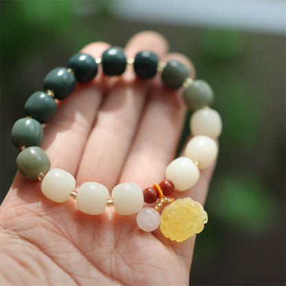 Pulsera de ámbar con semillas de bodhi y loto de la paz con degradado Mythstone