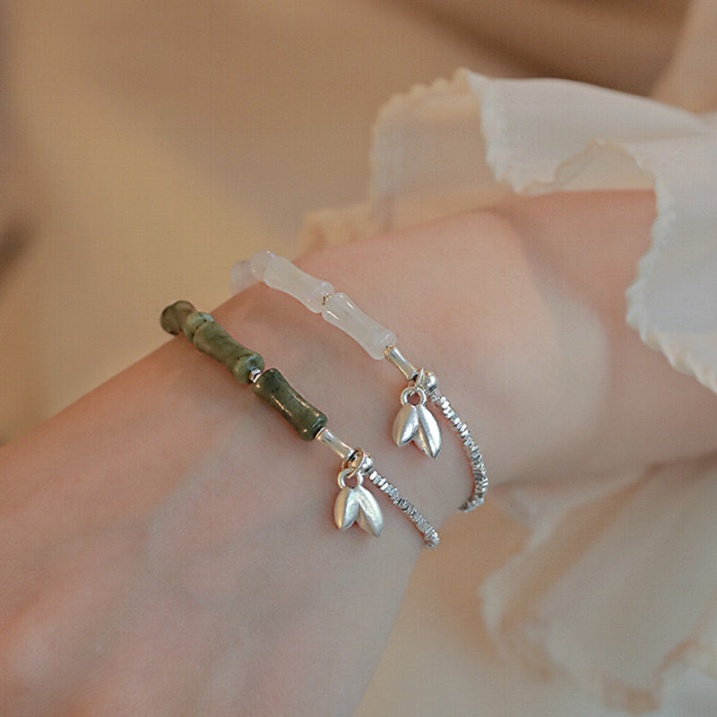 Pulsera de la suerte con diseño de bambú y peridoto en plata de ley 925 de Mythstone