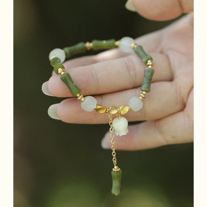 Pulsera de riqueza con lirio de los valles y jade de bambú verde Mythstone