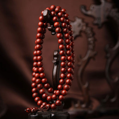 Pulsera de meditación con 108 cuentas de sándalo rojo y hojas pequeñas tibetanas Mythstone