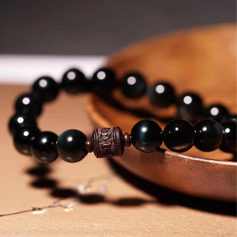 Pulsera curativa con personaje Om Mani Padme Hum Fu y obsidiana arcoíris con brillo dorado natural de Mythstone 