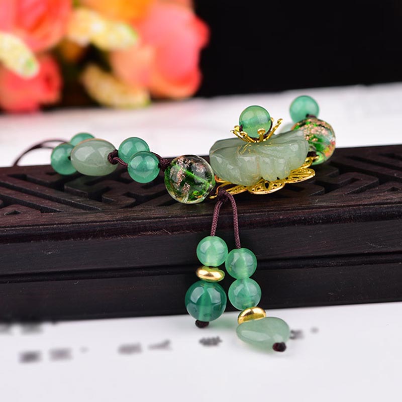 Pulsera de jade verde natural con flor colgante y suerte de Mythstone