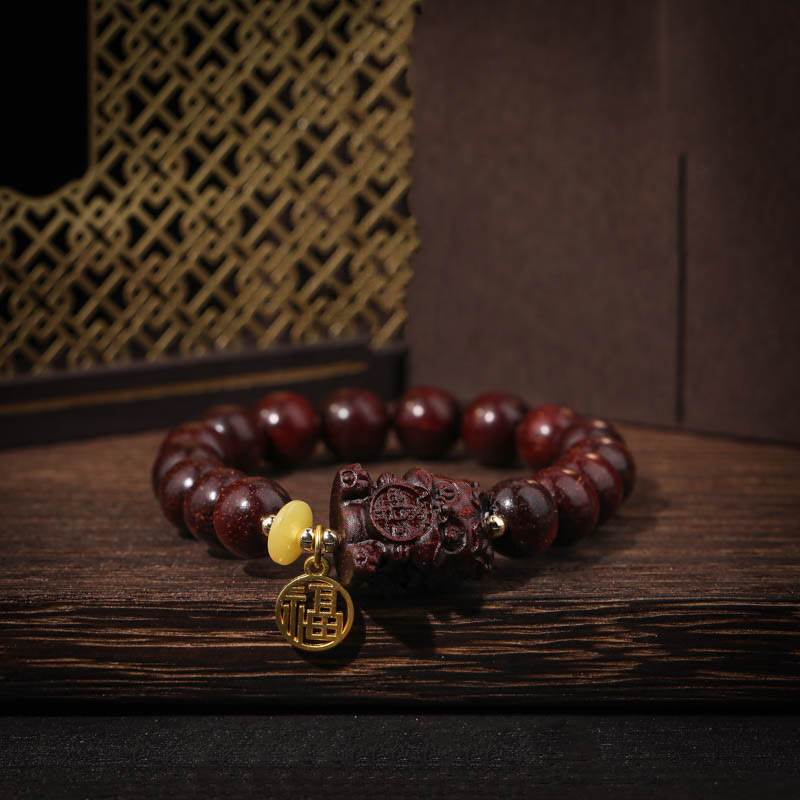 Mythstone Small Leaf Red Sandalwood Gold Swallower Calm Bracelet