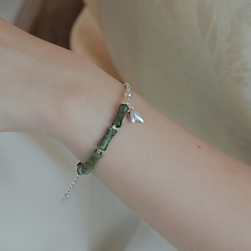 Pulsera de la suerte con diseño de bambú y peridoto en plata de ley 925 de Mythstone