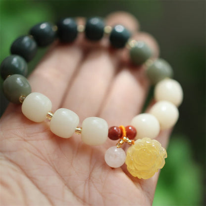 Pulsera de ámbar con semillas de bodhi y loto de la paz con degradado Mythstone