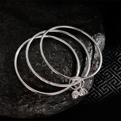 Pulsera brazalete de cobre blanco con flor de loto Mythstone New Beginning 