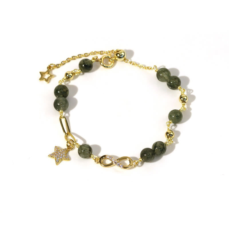 Pulsera de protección con estrellas del amor eterno y cuarzo rutilado verde en oro de 14 quilates de Mythstone con lazo Möbius 