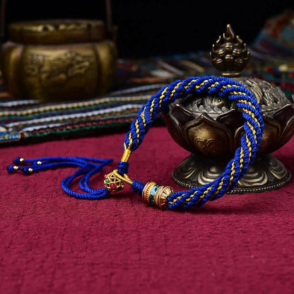 Pulsera de hilo tejido con amuleto de la suerte Thangka tibetano Mythstone hecha a mano