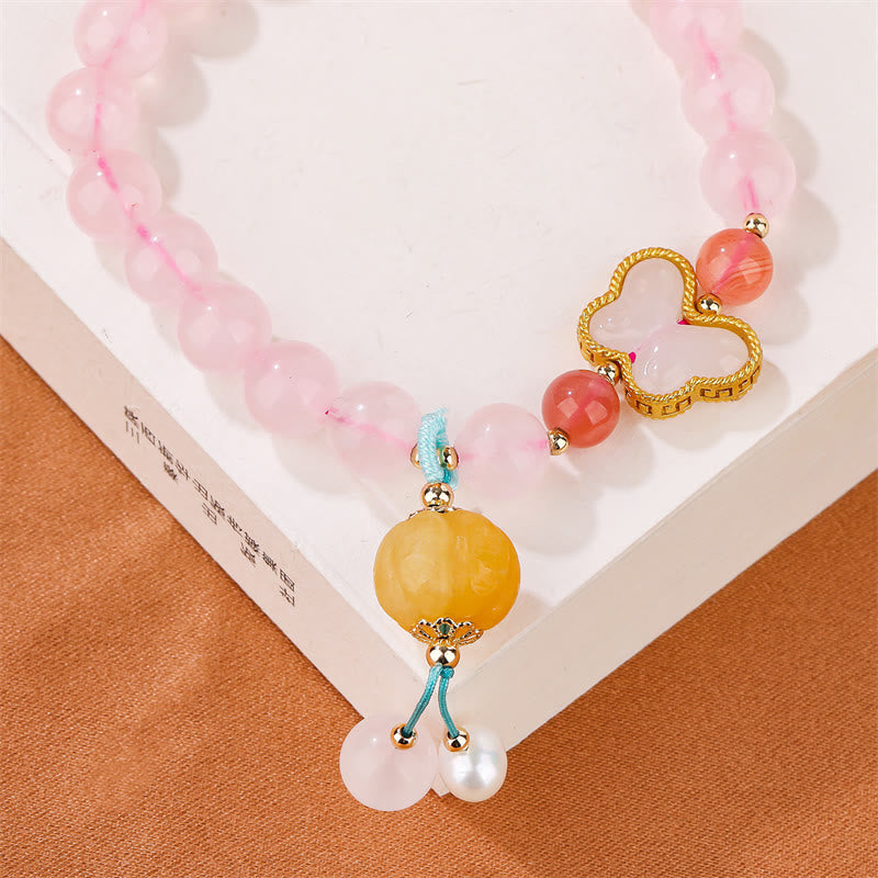 Pulsera de amor con forma de calabaza y mariposa de cristal rosa natural Mythstone 