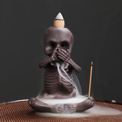 Quemador de incienso de arcilla morada con forma de calavera fantasma de Mythstone, fuente de humo con reflujo, decoración de la paz