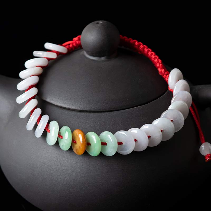 Pulsera tejida con hilo rojo de la suerte y jade redondo Mythstone