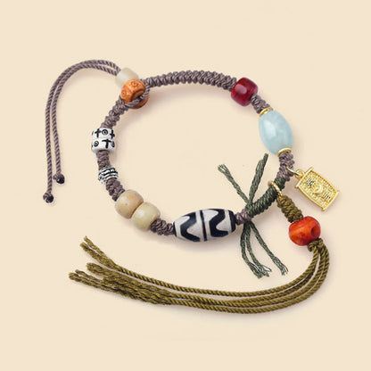 Pulsera de cuerda de la riqueza con cuentas tibetanas Dzi y hueso de yak de ágata