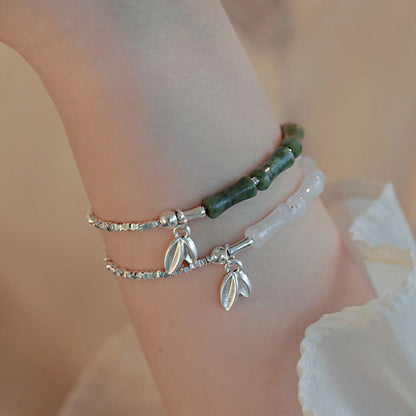 Pulsera de la suerte con diseño de bambú y peridoto en plata de ley 925 de Mythstone