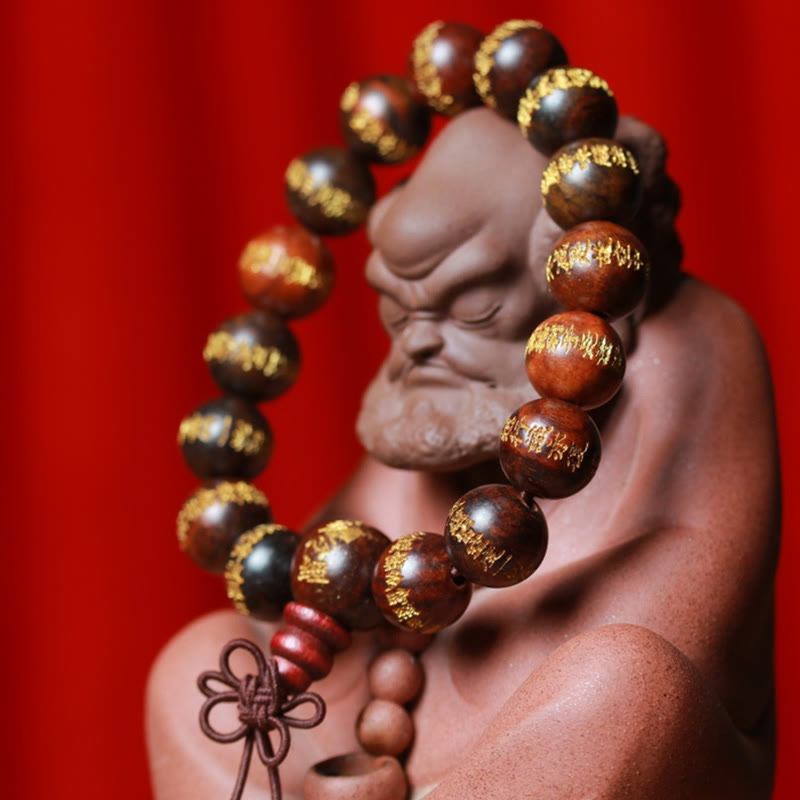 Pulsera de curación con sutra del corazón de palisandro tibetano Mythstone grabada