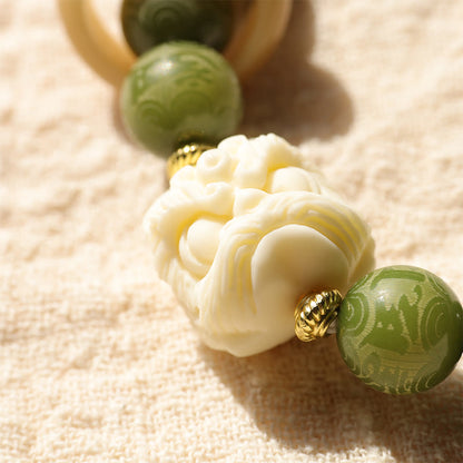 Mythstone Green Bodhi Seed Ivory Fruit Dancing Lion Om Mani Padme Hum Engraved Peace Bracelet