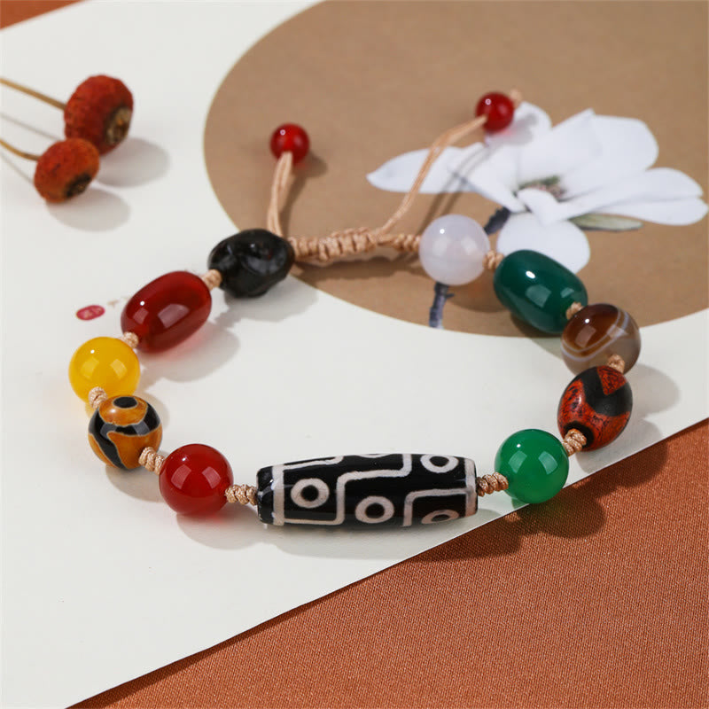 Pulsera de protección de riqueza de ágata con cuentas Dzi tibetanas de nueve ojos Mythstone 