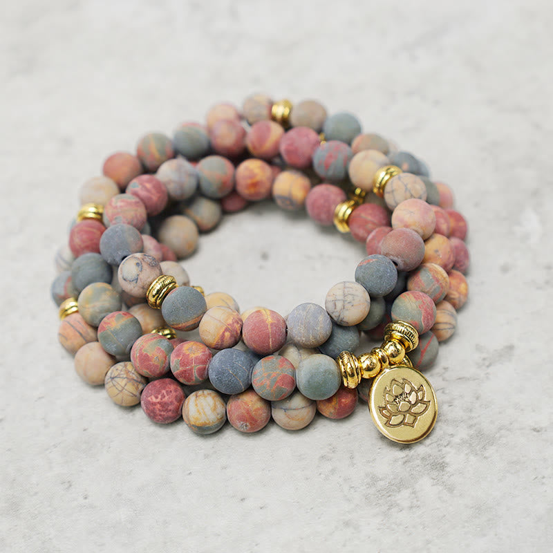 Pulsera de energía de coraje con piedra de jaspe Picasso y 108 cuentas Mala de MythStone