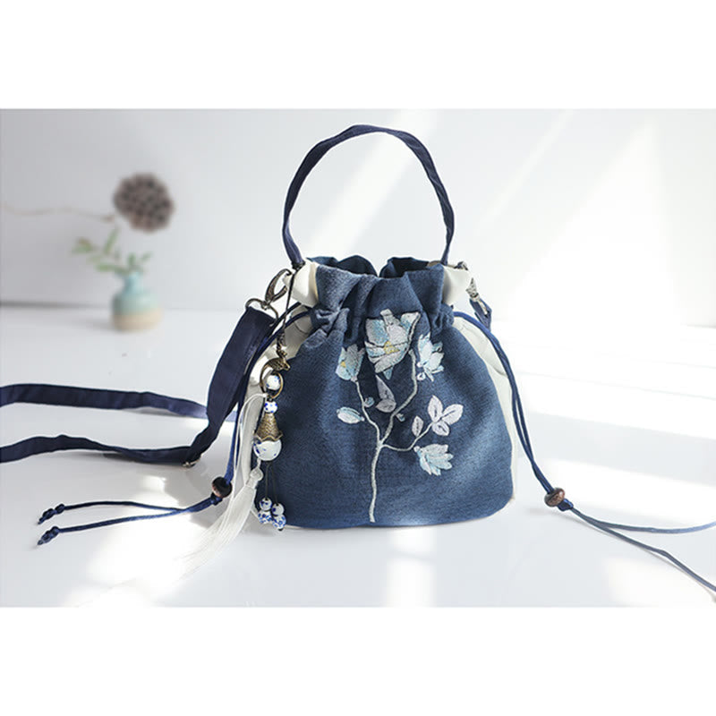 Bolso de mano de lona con flores bordadas a mano de Mythstone