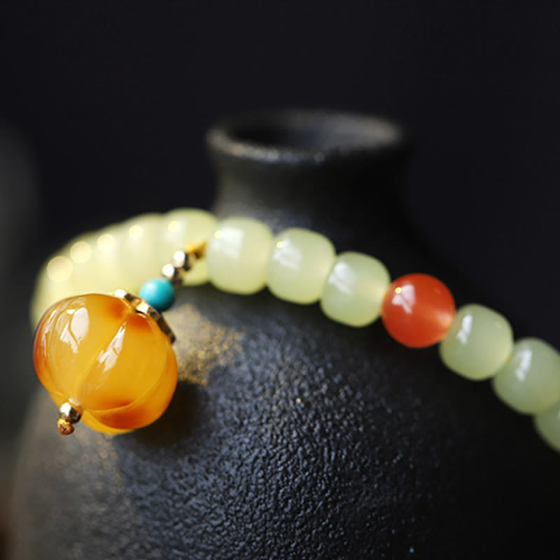 Pulsera de prosperidad con cristal de ágata roja, ámbar y calabaza de jade hetiano natural