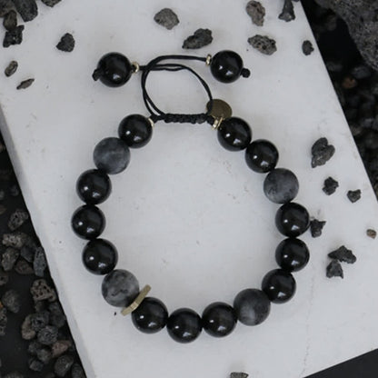 Pulsera purificadora con piedra de obsidiana negra y purpurina negra Mythstone 