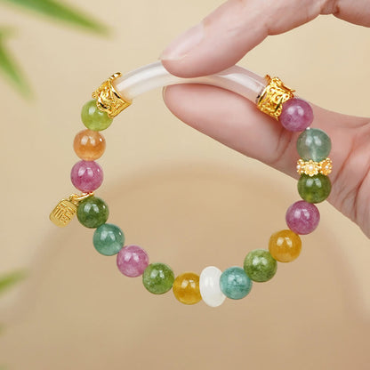 Pulsera con dijes de turmalina y calcedonia de colores Mythstone con carácter positivo Fu