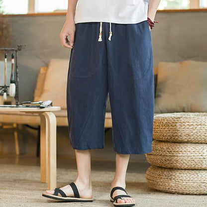 Pantalones anchos de lino de color liso de longitud media para hombre de Mythstone con bolsillos 