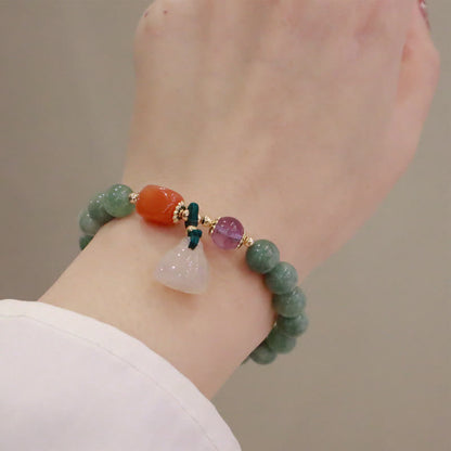 Pulsera curativa de cristal de amatista con hebilla de paz y loto de jade cian y calabaza Mythstone