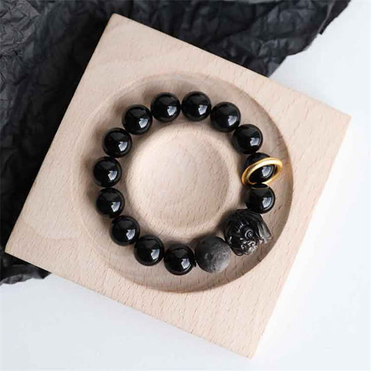 Pulsera de fuerza con león de obsidiana plateada y brillo de obsidiana negra Mythstone