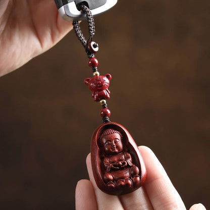 Llavero con amuleto de protección del zodíaco chino con forma de Buda de cinabrio y sándalo rojo y hoja pequeña de piedra mitológica