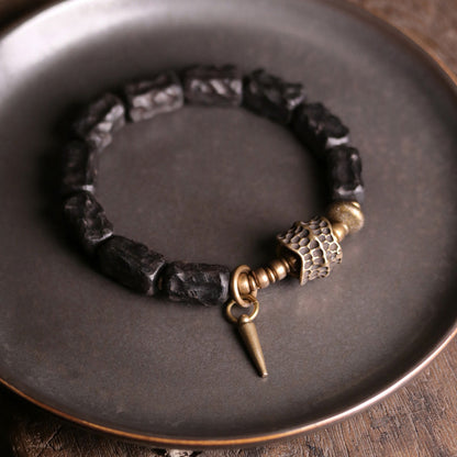 Pulsera de pareja con protección del equilibrio de cobre y madera de ébano Mythstone